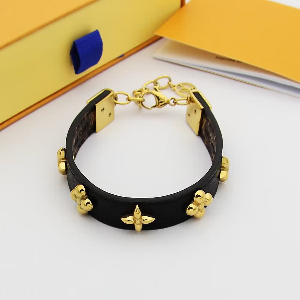 Louis Vuitton Black Leather Bracelet with Gold Accents